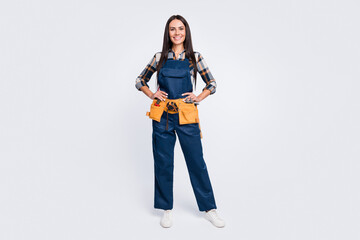 Full size photo of happy good mood smiling handyman woman builder wear uniform isolated on white...