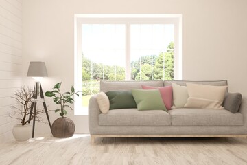 White living room with sofa and summer landscape in window. Scandinavian interior design. 3D illustration