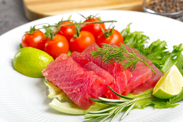 tuna sushi, Tuna carpaccio, tuna sashimi with vegetables. healthy eating with seafood, we cook at home