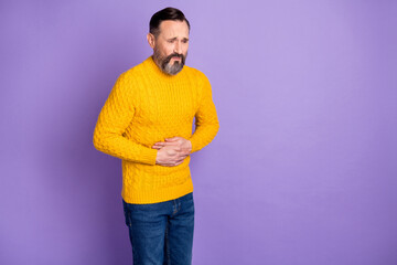 Profile side photo of mature man unhappy unwell ache ill infection belly stomachache isolated over purple color background