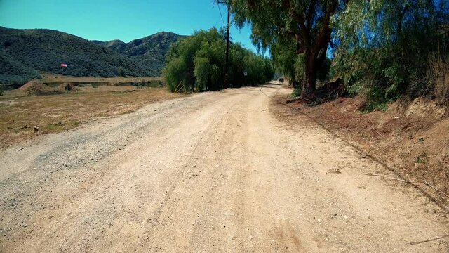 Slowly Driving Down Empty Private Dirt Ranch Road