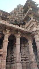 Beautiful artistic design on  stone, stone workmanship on temple wall