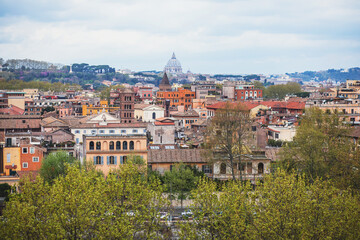 Fototapeta premium Rome panorama, Lazio, Italy, beautiful panoramic vibrant summer wide view of Roma and Vatican, with cathedrals, cityscape and scenery beyond the city, seen from observation deck