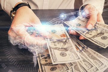 Multi exposure of brain drawing hologram and us dollars bills and man hands. Ai invest concept