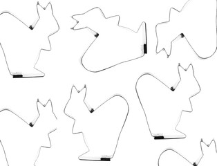 Metal cookie cutter in the shape squirrel. form for cutting dough on a white background.