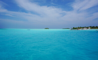 Tropical island with palm trees. empty space with beautiful turquoise lagoon