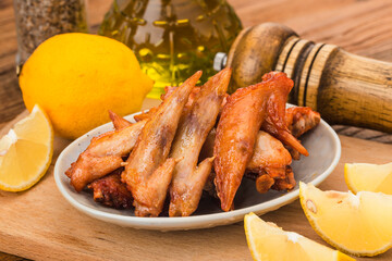 A plate of freshly baked chicken wings，Chicken Wing Tip