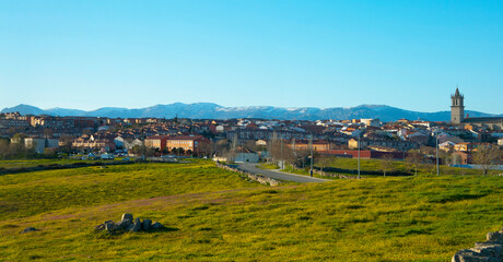 Fototapeta na wymiar Colmenar Viejo skyline with the Guadarrama range snowy in the background