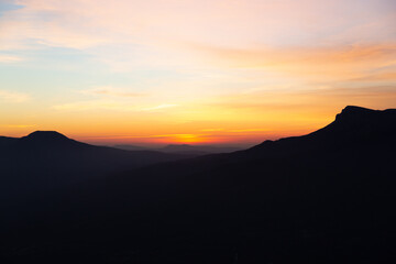 Evening mountain landscape, sunset pink-purple sky of Demerdzhi