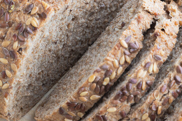 Bread with seeds on a wooden board