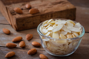 Almond slices in glass bowl.