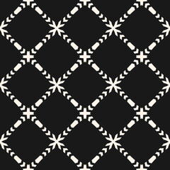 Vector ornamental seamless pattern. Elegant monochrome geometric ornament texture with flower silhouettes, crosses, grid, lattice, mesh. Abstract black and white floral background. Dark repeat design