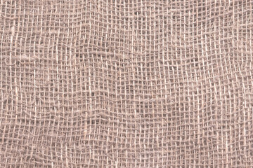 The structure of burlap is a fabric made of coarse, thick, vegetable fibers.