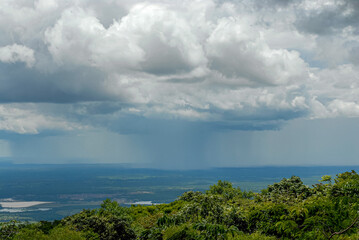 Fototapeta na wymiar Raining in the Chapada dos Guimaraes National Park, Mato Grosso, Brazil on December 10, 2006.
