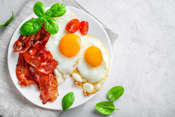 Traditional american breakfast with bacon and eggs