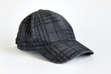 Fototapeta na wymiar Head cap with plaid dark blue fabric pattern on white background.
