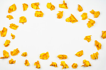 New idea concept. A group of yellow crumpled paper balls on white background with copy space