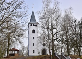 Fototapeta na wymiar Former church on Cross Hill in Plzen Region now serves as a lookout tower for tourists, West Bohemia, Czech Republic.
