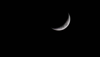 Obraz na płótnie Canvas A beautiful waxing crescent moon