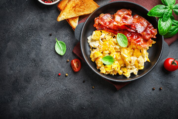 Traditional american breakfast with bacon and eggs