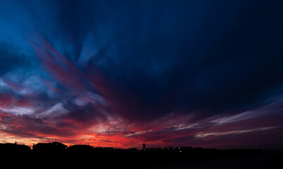 Colors in the sky after golden hour, a sunset over the city 