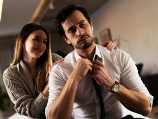 Young man having a problem. Girlfriend comforting her sad boyfriend..