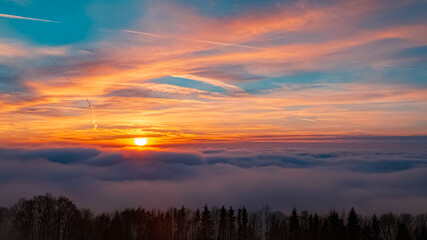 Obraz premium Beautiful sunset above the clouds near Kostenz, Bavarian forest, Bavaria, Germany