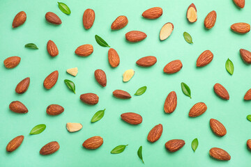 Whole and halved almond nuts pattern