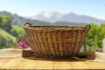 Wooden basket and summer landscape 