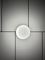 Round lamp on the wall