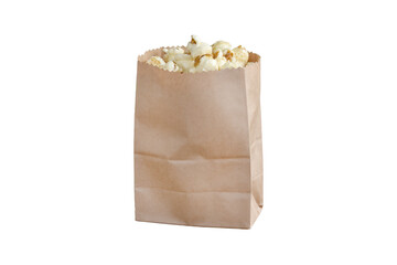 Sweet popcorn in a brown paper bag on white background.