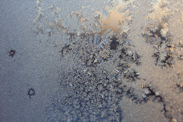 Frosty drawings on window glass