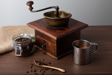 Vintage manual hand coffee grinder for grinding coffee beans.