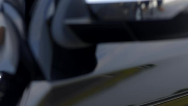 Business Male hand open the car door pulling the handle of a luxury car and get in the car.