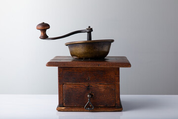 Vintage manual hand coffee grinder for grinding coffee beans.