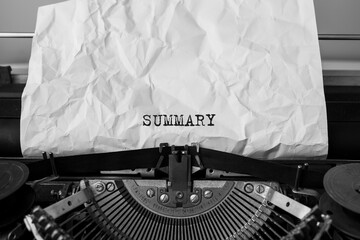 Text Summary typed on retro typewriter