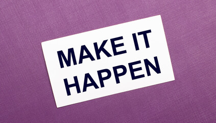 On a lilac background, a white card with the words MAKE IT HAPPEN
