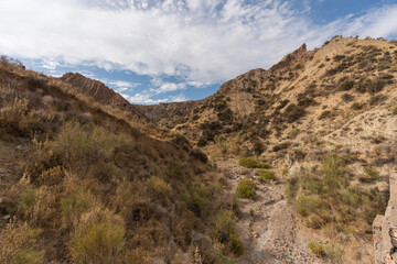 dry stream in a mountainous area in southern Spain