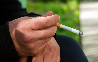 man with a cigarette close up