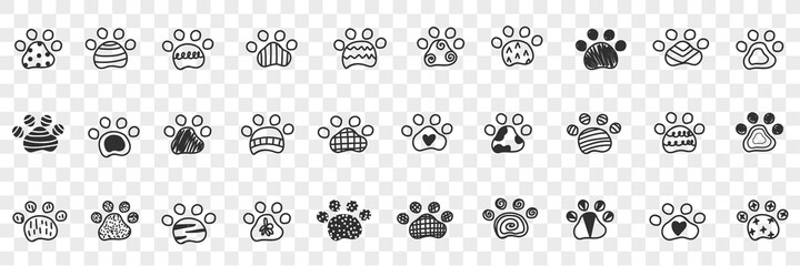Animals paws footprints doodle set. Collection of hand drawn footprints imprints of animals dogs with various patterns in rows isolated on transparent background - obrazy, fototapety, plakaty
