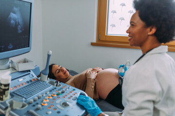 Pregnant woman on ultrasound at hospital