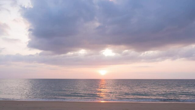 heavenly clouds sky in twilight sunset time at the sea. colorful fluffy clouds and sweet pink sunlight shine on the sea and sky. moving fast clouds on a cloudy day. dramatic groud of clouds 