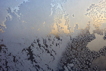 Frosty drawings on window glass