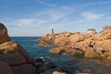 Fototapeta na wymiar Rocks, sea and lighthouse
