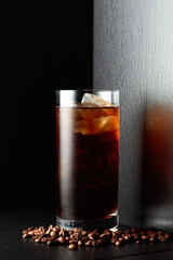 Iced coffee with coffee beans.