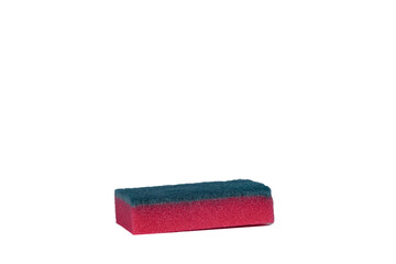 One red sponge for washing dishes on a white background. Isolated.