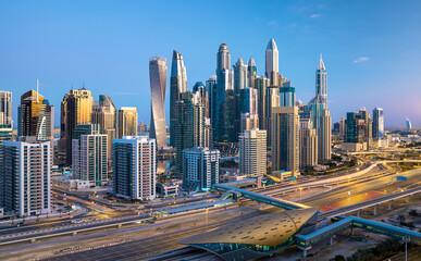 Amazing rooftop view on Dubai Marina skyscrapers and Sheikh Zayed road, Dubai, United Arab...