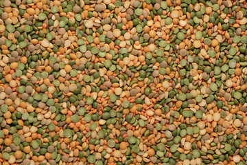 Food background from lentils and peas. top view