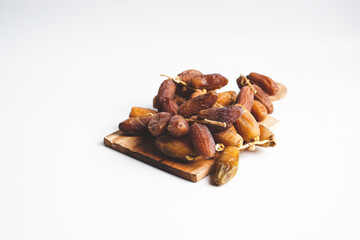 close up of dates with white background