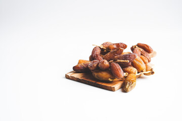 close up of dates with white background